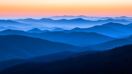 A panoramic view of the alpine mountains at sunrise

