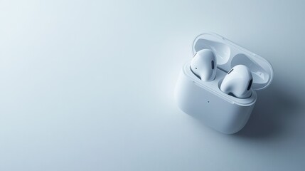 Isolated image of a pair of wireless earbuds with a sleek case on a white background, perfect for promoting audio products.