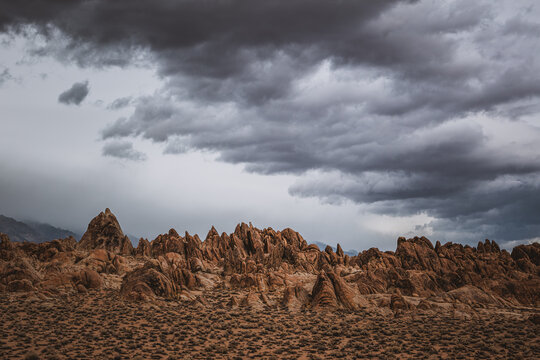 Stormy Sky Over Rugged Rock Formations in a Desert Landscape near the eastern Sierra Mountains in California