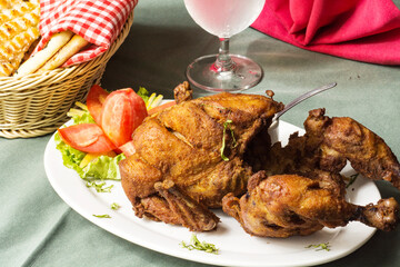 Chicken Steam Roast | Chicken Roast on Table with fresh salad garnishing. Naan in Background