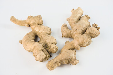 Fresh and Organic Ginger Roots Isolated on a White Background