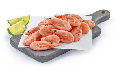 Krewetki na desce do krojenia © Jolaya
