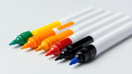 Isolated image of a set of colored markers on a clean white surface, perfect for school supplies promotions.