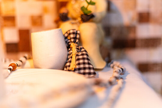 Offering for old black man, Umbanda Afro-Brazilian religion, Ax&eacute;, Orix&aacute;, Sarav&aacute;! The Umbanda ritual. Umbanda sculpture object. Candle, light, religion, African. Rio de Janeiro, Brazil.