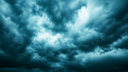 Obraz premium Dramatic dark clouds creating a stormy atmosphere in the sky