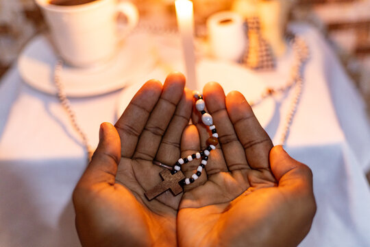 Offering for old black man, Umbanda Afro-Brazilian religion, Ax&eacute;, Orix&aacute;, Sarav&aacute;! The Umbanda ritual. Umbanda sculpture object. Candle, light, religion, African. Rio de Janeiro, Brazil.