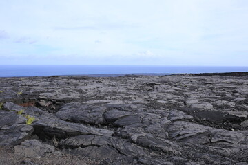 Solidified Lava Field with Ocean Horizon in Hawai'i Volcanoes National Park