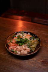 Pickles: garlic, cucumbers, tomatoes, cabbage. Restaurant dish.