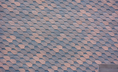 The roof of the building is covered with bitumen flexible tiles.