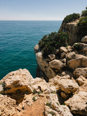 Enjoy stunning coastal view from magnificent rocky cliffside overlooking ocean. Immerse yourself in...