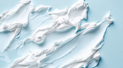 Obraz premium cream texture forming abstract patterns on a pale blue matte surface generative ai