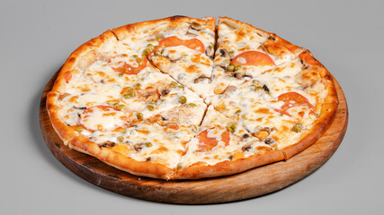 Delicious pizza isolated on wooden board