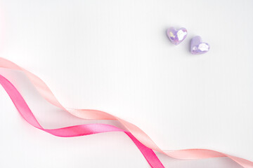 valentine romance simple white background with pink ribbon and love sign symbol empty space