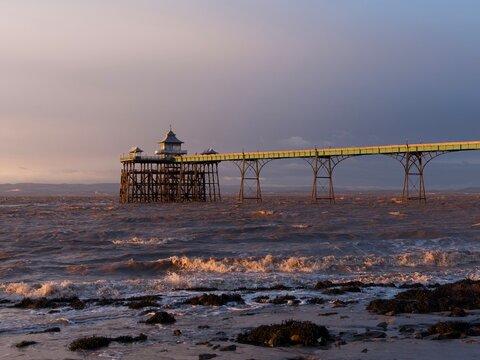 pier at sunset - Powered by Adobe