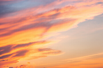 changing weather forecast. global warming. red clouds on the bue evening sky. dramatic sunset...
