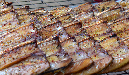 Smoked and grilled fish at a street market in Lithuania