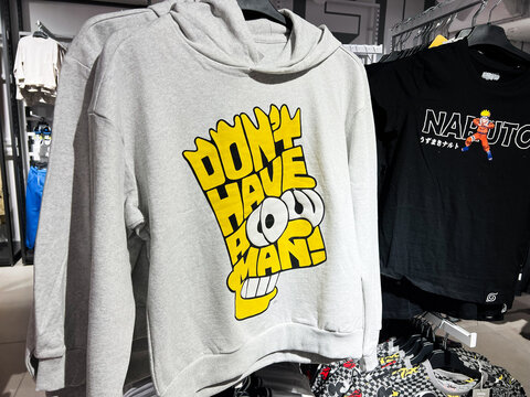 Kyiv, Ukraine - February 05, 2025: Stylish hoodies featuring bold designs and Bart Simpson popular characters in a clothing store