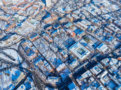 Old Harvard Yard aerial view in winter including Memorial Hall, Memorial Church, Widener Library and University Hall in historic center of Cambridge, Massachusetts MA, USA. 
