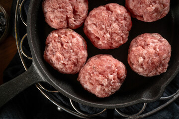 Fresh raw pork meatballs with spices