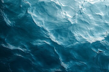 Obraz premium Water ripples on a light blue water texture background