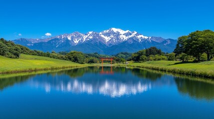 Serene Japanese Garden with a Red Torii Gate and Majestic Snow-Capped Mountains