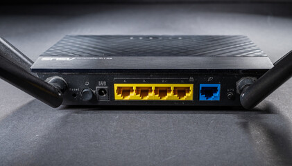 Gothenburg, Sweden - december 18 2024: asus wireless router rear view with ethernet ports.