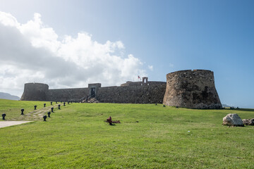 Open green field surrounding Fortaleza San Fernando, Monte Cristi, Dominican Republic, Dec 29, 2018.
