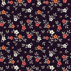 Seamless floral pattern with red and white flowers on a dark background. Seamless retro floral pattern with soft pastel flowers on navy blue.
