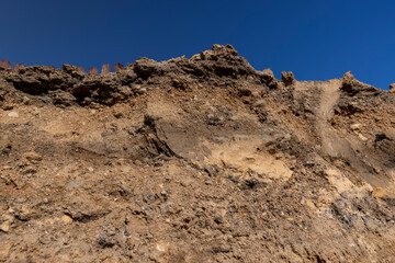 a deep hole in the ground on the site of which a highway was started