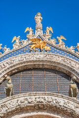 Obraz premium Facade of the Saint Mark's Basilica is the cathedral of Venice, in Italo-Byzantine architecture. It is symbol of Venetian wealth and power, since 11th century it known as Church of Gold. Italy, 2019
