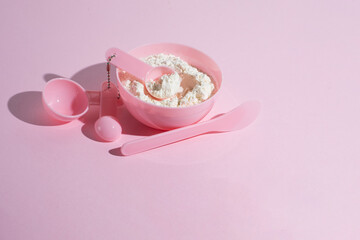 Cosmetic clay - face and body skin care - on white background. Spa concept
