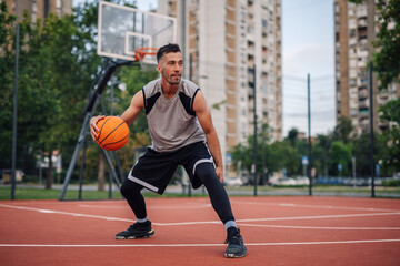 Basketball player dribbling and preparing to shoot