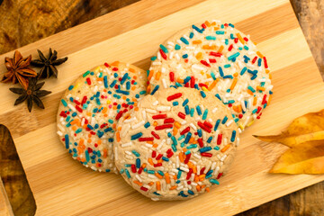 Colorful Sprinkle Cookies on Wooden Table
