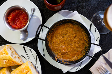 Morteruelo is dish from Cuenca, province of Castilla La Mancha, east of Madrid. It is a pate spread of game meats Spain.