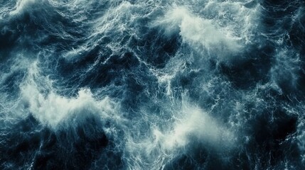 Obraz premium Aerial view of turbulent ocean waves, stormy sea, background texture