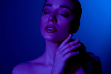 Photo of gorgeous charming dreamy lady feel desire pleasure isolated on blue neon color background