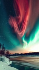 Obraz premium Aurora borealis over arctic coastline at night and phone background