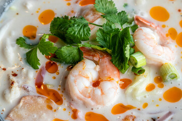 Thai coconut Tom Kha soup with shrimp. Detail.