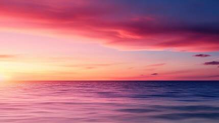Fototapeta premium Serene ocean at sunset with vibrant colors reflecting on water surface