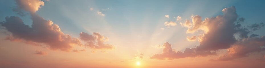 Fototapeta premium Stunning sunset panorama vast cloudscapes in warm hues of orange yellow, red. Dramatic light highlights clouds. Ideal for background scenes in various contexts. Beautiful natural landscape. Excellent