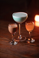 cocktail in a restaurant, professional shooting. a cocktail glass filled with a bright drink, decorated with additional decor. professional photography of a drink