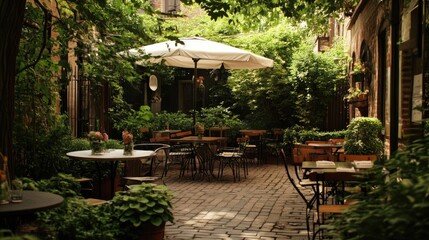 Obraz premium Serene Outdoor Cafe Setting with Lush Greenery and Inviting Ambiance