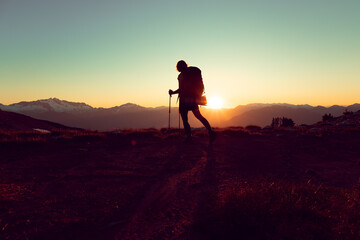 Woman hiker at sunset