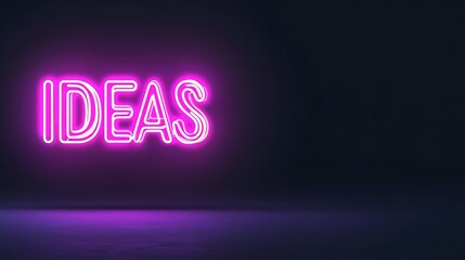 Neon sign displaying the word "IDEAS" in vibrant pink against a dark background.