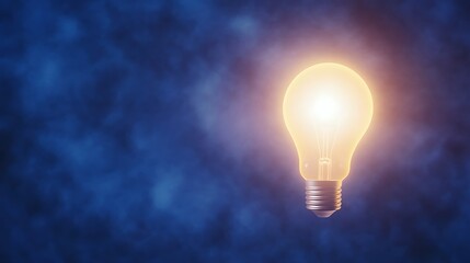 Light bulb glowing against a blue background, symbolizing ideas and creativity.