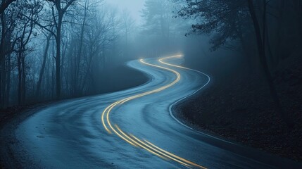 Mystical Winding Road Through Foggy Forest with Light Trails at Night