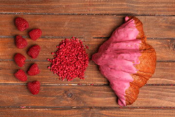 set of dried and fresh raspberries and croissant