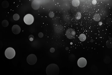 Abstract black background with white bokeh lights
