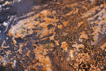 Cooking residue on a grill showing signs of recent use