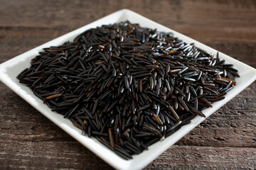 A closeup view of a small dish of wild rice.